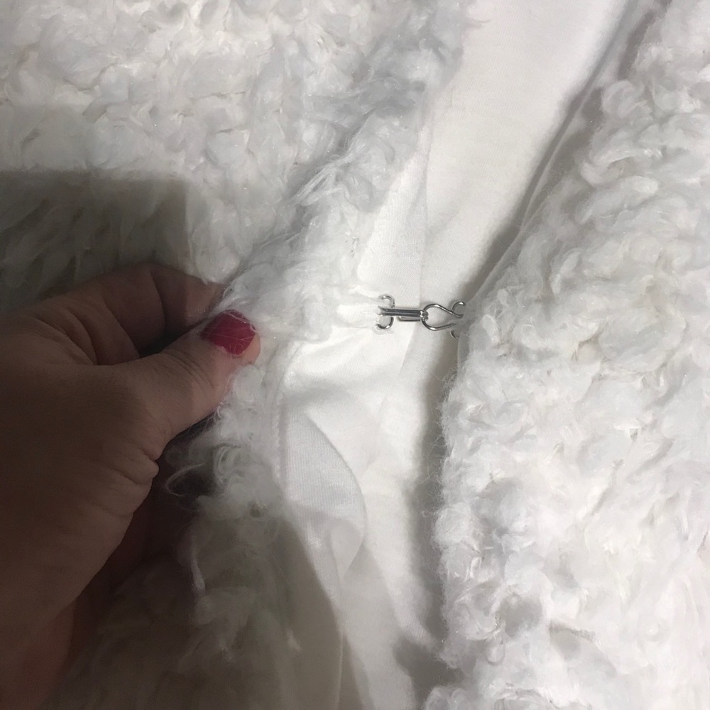 Canda furry white vest